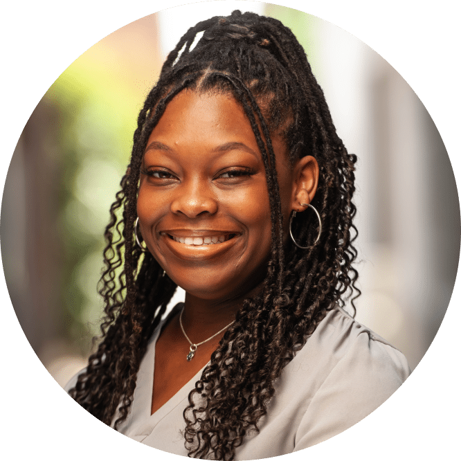 A woman smiling at the camera.